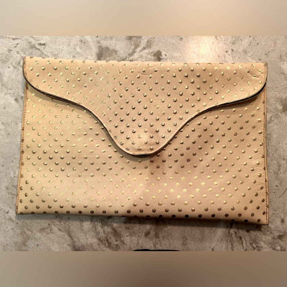 Cream and gold clutch
